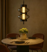 Daya Worldwide Ethereal Glow pendant light hanging from ceiling, modern design with warm ambient illumination in a stylish interior setting