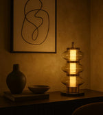 Daya Worldwide GLOW STACK table lamp with modern design, featuring stacked glass and metal accents for stylish illumination.