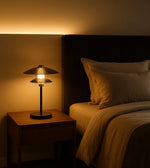 Daya Worldwide Zen Eclipse table lamp with sleek modern design, featuring a round base and soft glowing shade.