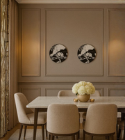 marble-pattern circular LED wall lights displayed symmetrically in a modern dining interior.