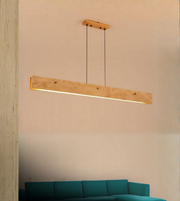 Minimal long bar pendant light with warm LED glow perfect for seating area and dinning area