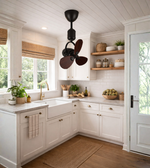 Decorative mini ceiling fan with wooden blades installed in a kitchen
