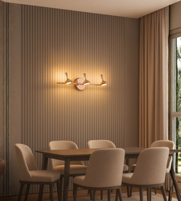 Rose Gold Triple-Arm Modern Wall Light installed in dining room interior