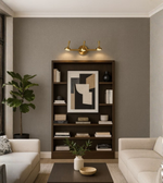 Copper three-spot luxury wall lamp on textured wall paneling