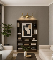 Copper three-spot luxury wall lamp on textured wall paneling