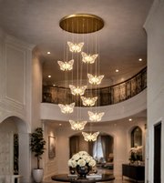 Luxury butterfly cascade chandelier hanging in double height foyer interior