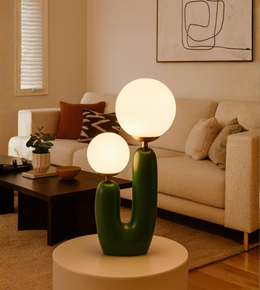 Art-inspired ambient table lamp with soft warm glow.