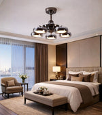 Designer LED ceiling fan with spotlight ring lights installed in a luxury bedroom interior