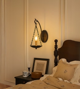 Decorative lantern charm wall hanging by Daya Worldwide, featuring intricate metal design for home decor.