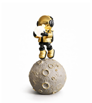 Luxury astronaut floor lamp with glowing orb and moon base for modern interior décor