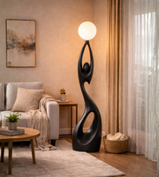 Modern feminine sculpture floor lamp by Daya Worldwide featuring a stylish, artistic statue with integrated lighting for contemporary decor.
