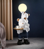 Playful bear duo sculpture by Daya Worldwide, featuring two carved bear figures in a stylish decorative statue.