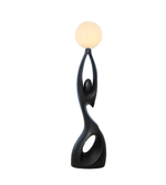 Modern feminine sculpture floor lamp by Daya Worldwide featuring a sleek, artistic statue design with integrated lighting.