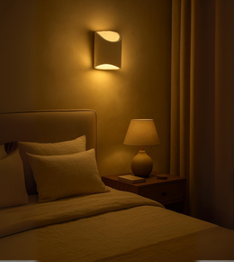 Solace Sculpt in white handcrafted wall lamp with soft dual glow. 