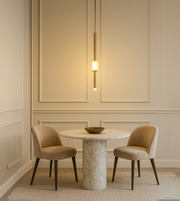 Linea brushed gold pendant light with slim vertical design.