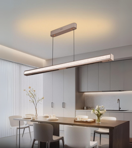 Strato Linear frosted crystal LED pendant suspended over minimal dining area.
