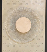 Modern stone halo wall light by Daya Worldwide, showcasing a sleek circular design with a soft glow on a contemporary wall.