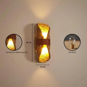Wall-mounted light fixture with dimensions and bulb details on a neutral background