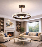 Luxury crystal ring chandelier with intricate design, hanging from ceiling, featuring sparkling crystals and elegant metal accents.
