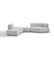 Daya Worldwide Pebble Modular Sofa in a contemporary living room with plush cushions and modern design.