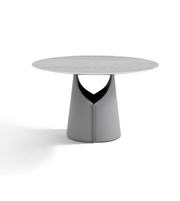 Daya Worldwide Luna Sculpt Dining Table featuring a sleek, modern design with a smooth wooden surface and sculpted legs.
