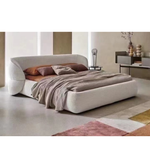 Daya Worldwide Cocoon Bed with a modern, cozy design featuring soft fabric and rounded edges in a stylish bedroom setting.