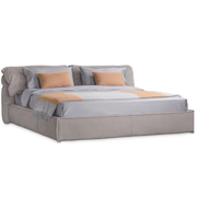 Daya Worldwide premium bed with sleek white bedding and modern wood frame, showcasing a stylish bedroom setup.