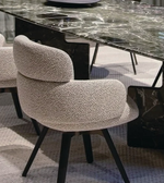 Modern Daya Worldwide dining chair with a sleek wooden frame and cushioned seat, ideal for contemporary dining rooms.