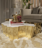 Sculpted Aurora coffee table by Daya Worldwide featuring a sleek, modern design with a smooth, curved surface and elegant finish.