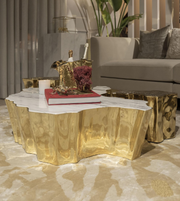 Sculpted Aurora coffee table by Daya Worldwide featuring a sleek, modern design with a smooth, curved surface and elegant finish.