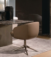 Modern swivel dining chair from Daya Worldwide featuring a sleek design, comfortable seat, and stylish wooden legs.