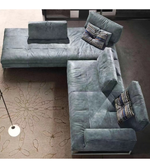 Modern Daya Worldwide sectional sofa with plush cushions and sleek design, perfect for contemporary living rooms.