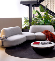 Luna Curve modular sofa by Daya Worldwide featuring smooth, curved fabric cushions and a contemporary design.