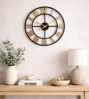 Black wall clock by Daya Worldwide featuring a modern round design with clear numeric hour markers.