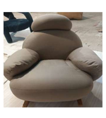 Daya Worldwide lounge chair with plush cushioning and modern design, ideal for relaxing in living rooms or lounge areas.
