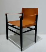 Urban Saddle Accent Chair, Daya Worldwide dining chair with a sleek, modern saddle-shaped design and plush upholstery.