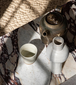Set of two Milano marble block coffee tables by Daya Worldwide featuring sleek marble surfaces and modern design.