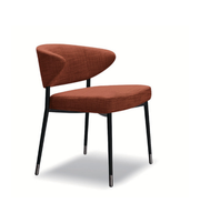 Modern Daya Worldwide dining chair with sleek design, wooden legs, and cushioned seat for contemporary dining room decor.