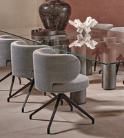 Modern swivel dining chair with wooden legs and cushioned seat, designed for comfort and style in contemporary dining spaces.