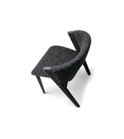 Modern arm dining chair with sleek design, wooden legs, and cushioned seat, perfect for contemporary dining rooms.