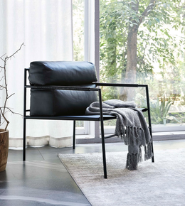 Modern Noir Frame Lounge Chair by Daya Worldwide featuring sleek black frame and plush upholstered seating for stylish comfort.