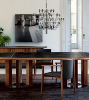 Orion marble dining table by Daya Worldwide featuring a sleek marble top and modern wooden legs for contemporary dining spaces.
