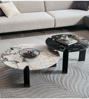 Daya Worldwide marble coffee table set with two round tables featuring white marble tops and sleek metal legs.