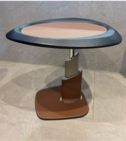 Spiral Orbit Side Table by Daya Worldwide featuring a modern, twisted metal design and a sleek surface for stylish decor.
