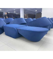 Blue BluMelt sofa bed by Daya Worldwide, showing a modern sofa that converts into a comfortable bed with sleek design and fabric upholstery.