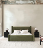 Olive upholstered bed with padded headboard and wooden legs, modern furniture piece from Daya Worldwide.