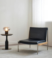 Daya Worldwide Luma Lounge Chair in modern design, featuring a sleek armchair with plush upholstery and stylish wooden legs.