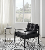 Daya Worldwide Orin lounge chair with sleek modern design, featuring a comfortable cushioned seat and stylish armrests.