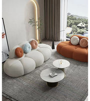 Pebble Cloud sofa by Daya Worldwide, featuring plush, cloud-like cushions and modern design in a stylish living room setting.