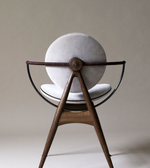 Daya Worldwide Orbit dining chair with sleek modern design and cushioned seat, ideal for contemporary dining rooms.